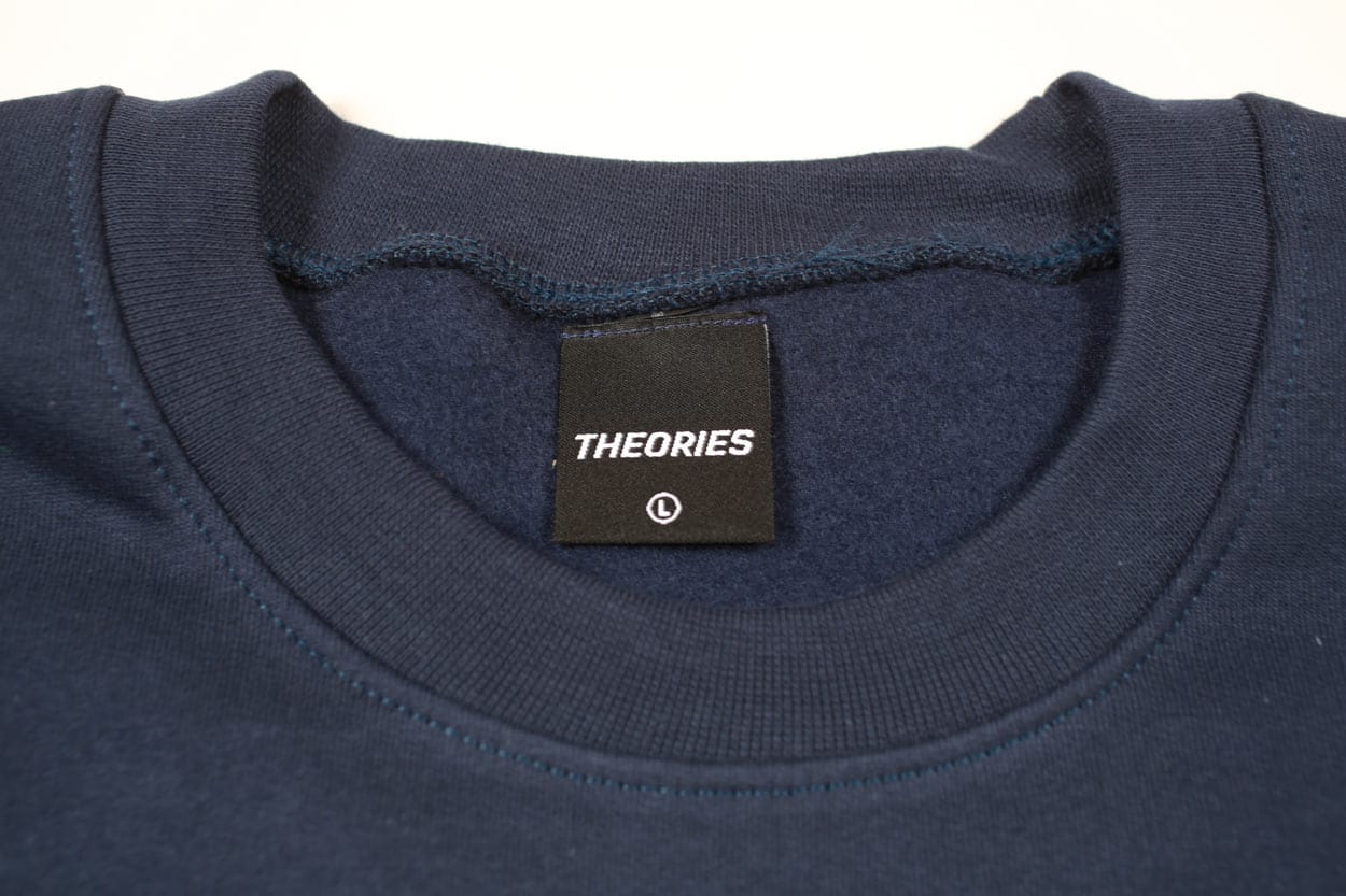 THEORIES OF ATLANTIS CREWNECK Theories Not What They Seem Crewneck - Navy